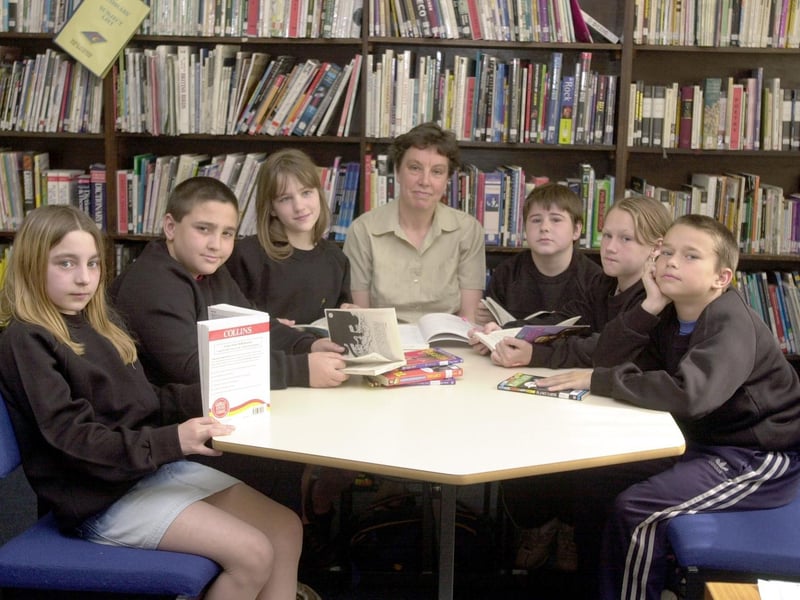 June 2002 and pupils are pictured during a literacy lesson. Pictured are Stevie MacCormick, Paul Wiley, Bobbie Waitte, librarian Bernadette Evans, Adam Hirst, Emma France and Andy Brewitt.