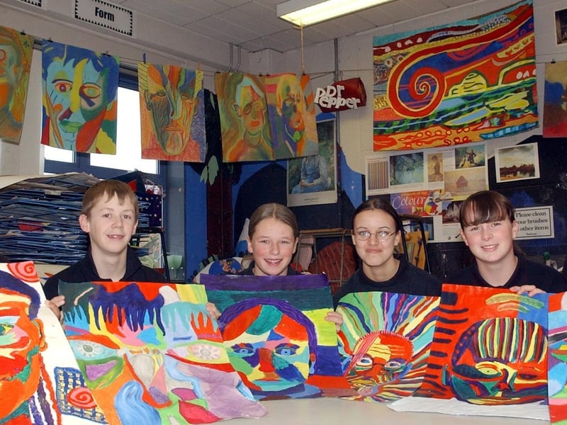 Art class pupils with their work pictured in December 2003.