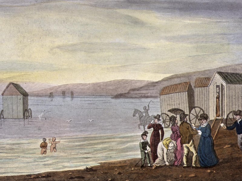 circa. 1813. A huddle of bathing machines trundle into the sea at Scarborough, allowing demure tourists to swim in total privacy.
Original Artwork: A print by J Green from Ackermann's 'Poetical Sketches of Scarborough'.