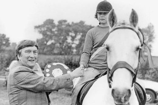 Denise Hall received her trophy at the Castleford Lions Club annual show jumping and horse show in 1985