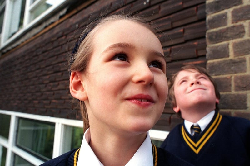 Pupils Jade Gilboy (left) and Jordan Elliot, both eight, look to the skies after bats were recently discovered around Holy Trinity Primary.