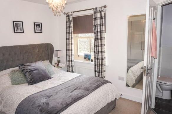 Upstairs are two good sized double bedrooms. The master enjoys extensive views over the area and out over the hills beyond.