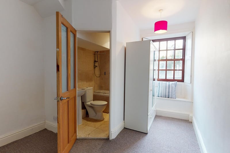 The charming ground floor apartment has one bedroom with an en-suite bathroom.