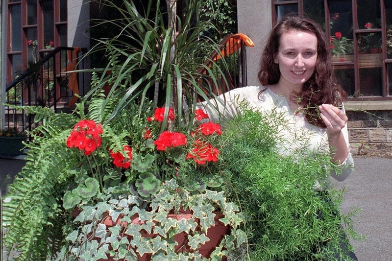 June 2000 and Bramley Trinity Methodist Church was holding a Millennium Flower Festival. Pictured is visitor Ella Westerman.