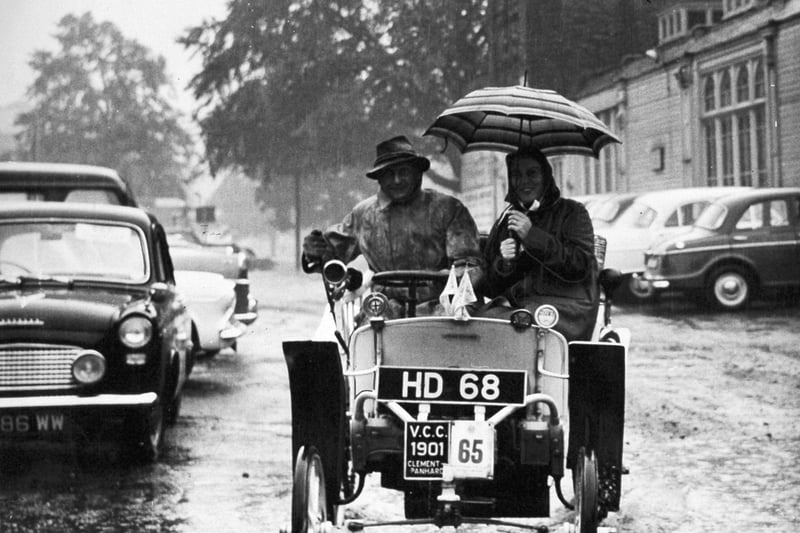 Harrogate, 3rd September 1961

Sheltered under an umbrella, Major James France and his wife take their 1901 Clement Panhard through pools of water on their way to the Concours D'Elegance event of the Veteran Car Rally at Harrogate.