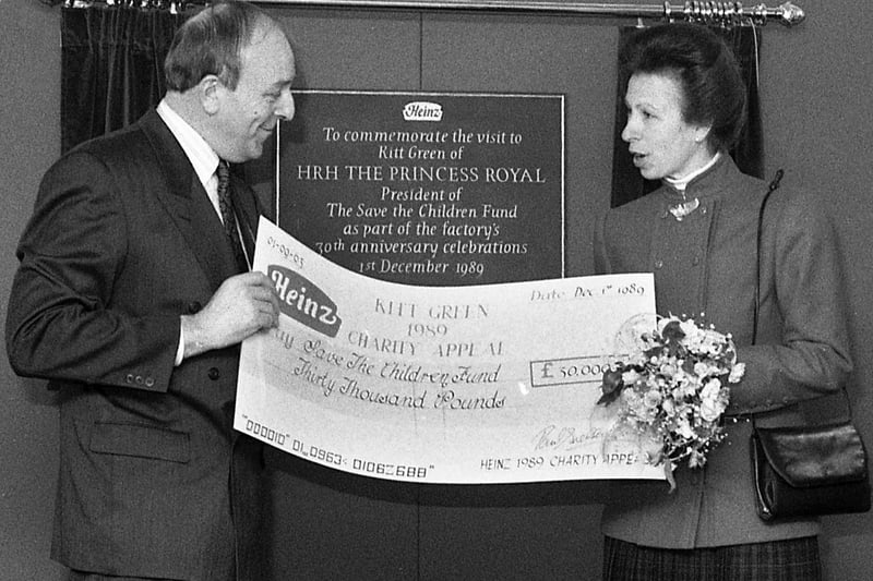 1989 - Princess Anne is presented with a £30,000 cheque for the Save the Children Fund, of which she was president, by Derek Dollman, Chairman of Heinz Kitt Green Fund Raising Committee.Sadly Derek died of a heart attack shortly after the princess left the factory.