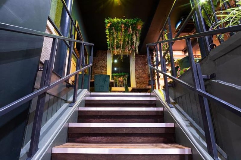 The stairs lead up to the second level of the newly refurbished restaurant