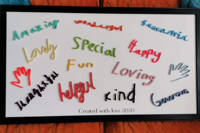 Shelley Mair wrote: "My mum and dad couldn't see their 14 grandchildren for so long, so I had this made for them. It's all of the children's handwriting of a word they used to describe their grandparents, hand cut by DSigns By Amy who is simply amazing at what she does."