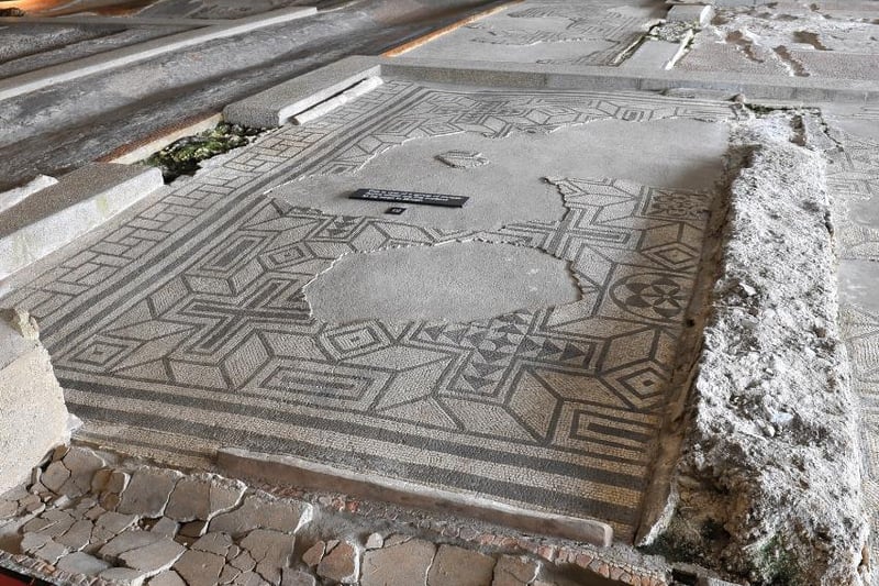 The Roman Palace was discovered by accident in 1960, during the digging of
a water main trench that cut through mosaic floors and massive wall
foundations. Today, visitors can see the remains of the north wing of the palace, with its fine mosaic floors, as well as many other important finds.