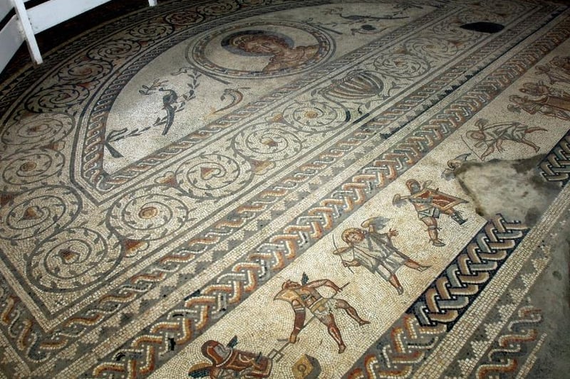Bignor Roman Villa is a large Roman courtyard villa which was discovered in 1811 by farmer George Tupper. It opened to the public in 1814 and is well known for its high quality mosaic floors, which are some of the most complete and intricate in the country.