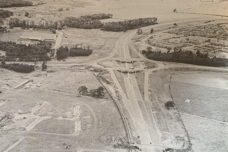 During the New Town years, Bretton was the first big township development in Peterborough with work starting in 1970. Our picture shows development underway with the Soke Parkway under construction.  At the top left of the picture is the Bretton Centre with the new Sainsbury store as its centrepiece alongside other shops and The Cresset.  Many new homes would follow.