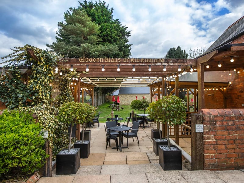 The Wooden Walls of Old England pub in High Street, Collingtree, just off the A45, was taken over by Amy and Martyn Thurley just two weeks ago. They worked tirelessly to make sure the outside space at the pub is ready for the official reopening launch this weekend, by relaying turf, dressing the barn and improving the outdoor seating area.