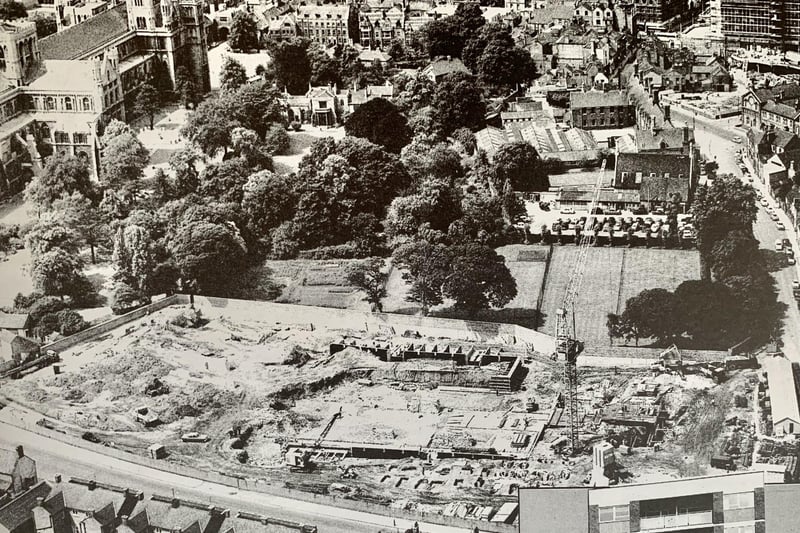 The building site in the forefront of this aerial shot  became  Peterborough’s first tower block, the 12-storey high St Mary’s Court.
It  consisted of 139 flats and  was built on a site in the old St Mary’s Street, which was a slum area of Eastgate.
The council had begun clearing the slums in the area in 1938 and this continued on and off until the 60s.The contract for building the flats was won by local company Mitchell Construction in 1964.
The contract was worth £540,000 and the plans included underground parking for 68 cars and 75 bikes. Work clearing the site began in March 1964 with the first  show flat opening in June the next yearbefore  an offical opening in December.
This photograph was taken in 1964 with the cathedral in the top left hand corner.