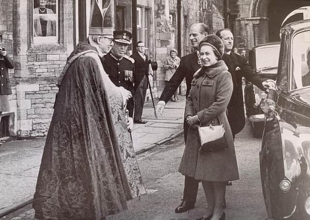 The Queen attending the Maundy service in Peterborough on her first visit to the city.