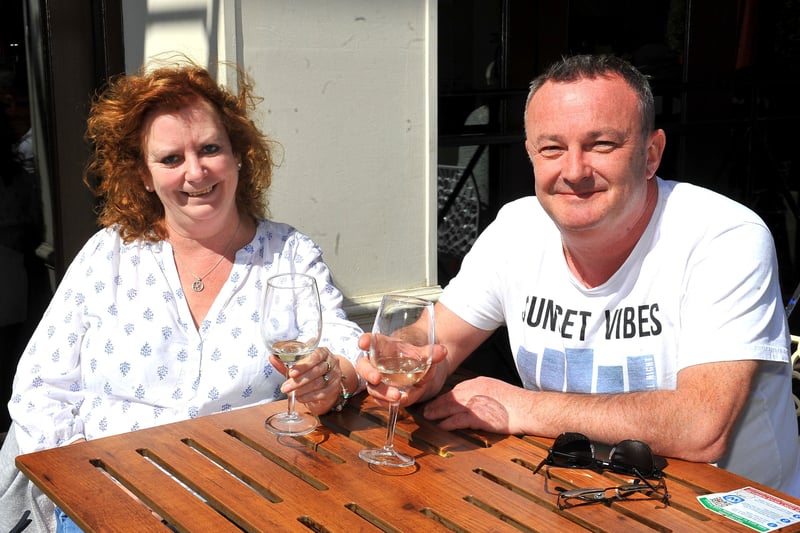Pub goers in Horsham enjoy the afternoon sun on Saturday. Pic S Robards SR2104171 SUS-210417-173309001
