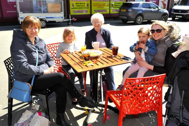 Pub goers in Horsham enjoy the afternoon sun on Saturday. Pic S Robards SR2104171 SUS-210417-173320001