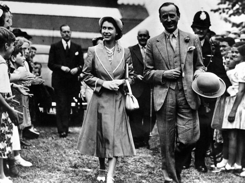 The then Princess Elizabeth being escorted round the Peterborough Show by Lord de Ramsey. We believe the picture was taken in 1951, do you know any more details?