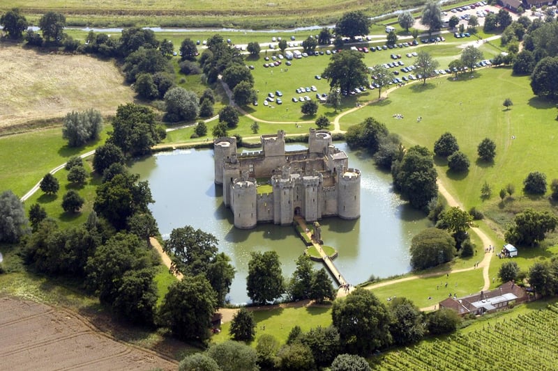 Bodiam Castle is a National Trust property near Robertsbridge, East Sussex, and is an archetypal 14th century moated castle with ruined interior.