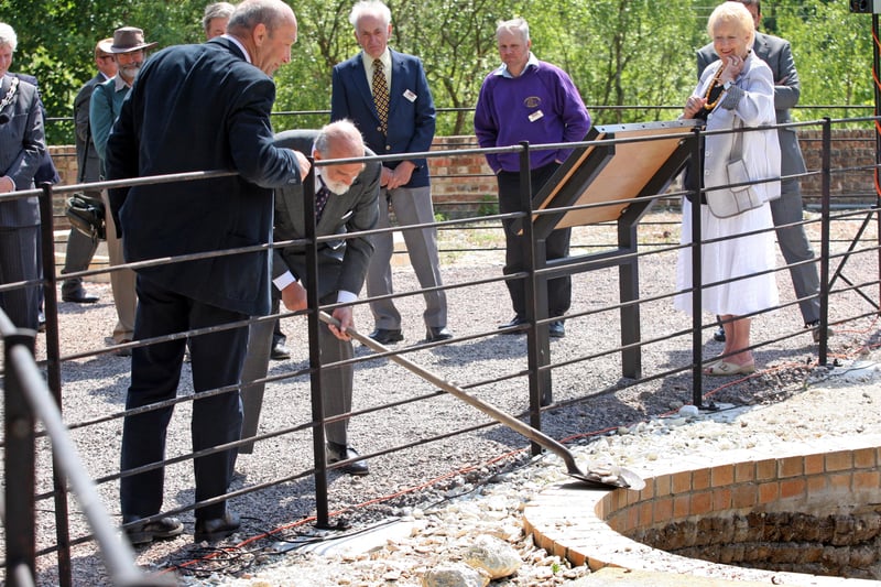 HOR 040411 Opening of lime kilns at Amberley Museum by Prince Michael of Kent. Prince Michael of Kent puts chalk into one of the kilns. photo by derek martin ENGSNL00120110405155033