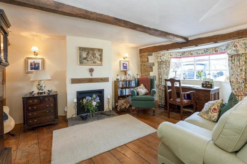 Living room described by estate agents as the 'snug' at The Old Wheatsheaf home in Adderbury (Image from Rightmove)