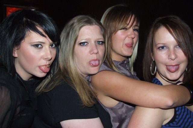 Tongues out in liquid Envy in 2009