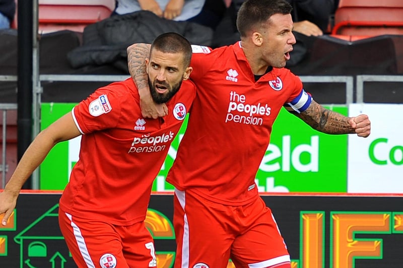Skipper Jimmy Smith celebrates with George Francomb against Bury in 2018