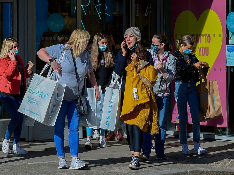 Happy early morning shoppers on Friday as non-essential retails outlets reopen. Photo: George Sweeney / Derry Journal.  DER2117GS – 018