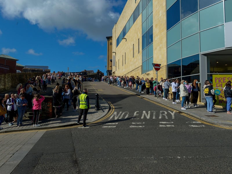 Hundreds of shoppers queue outside Primark on Friday morning as non-essential retails outlets reopen. Photo: George Sweeney / Derry Journal. DER2117GS – 014
