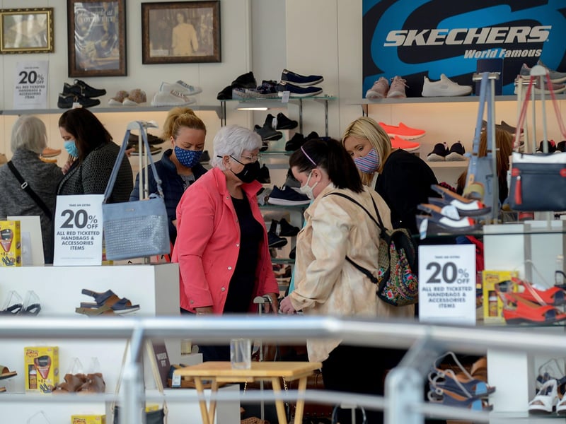 Shoppers on Friday morning as non-essential retails outlets reopened. Photo: George Sweeney / Derry Journal.  DER2117GS - 029