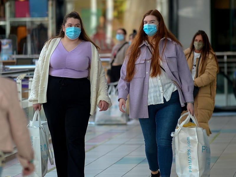 Happy early morning shoppers on Friday as non-essential retails outlets reopen. Photo: George Sweeney / Derry Journal.  DER2117GS – 030