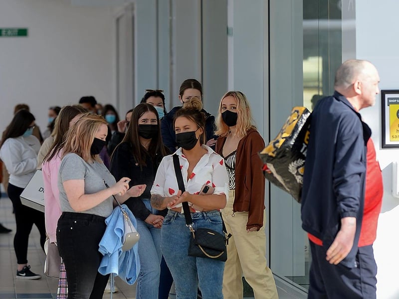 There were queues outside many shops early on Friday morning as non-essential retails outlets reopen. Photo: George Sweeney / Derry Journal.  DER2117GS – 031