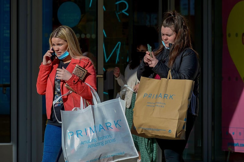 Satisfied shoppers early on Friday morning as non-essential retails outlets reopen. Photo: George Sweeney / Derry Journal.  DER2117GS – 019