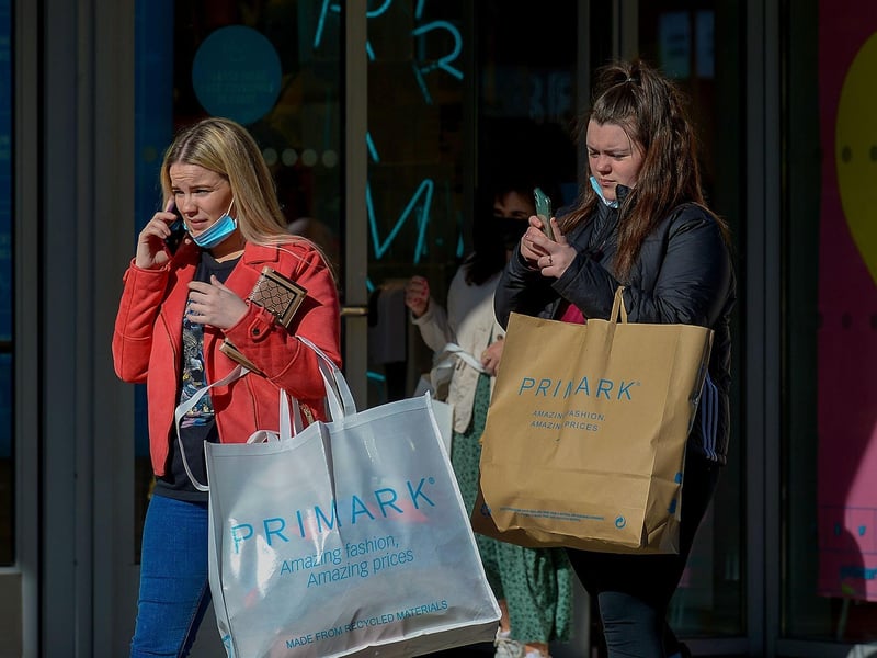 Satisfied shoppers early on Friday morning as non-essential retails outlets reopen. Photo: George Sweeney / Derry Journal.  DER2117GS – 019