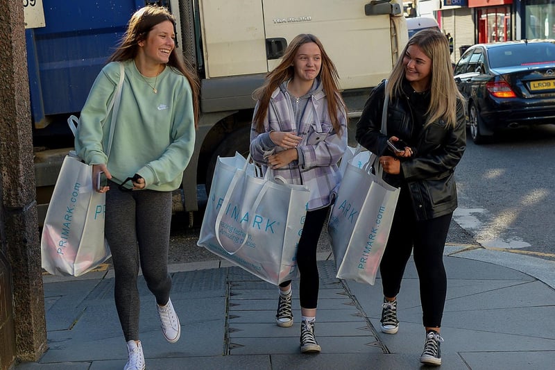 Happy shoppers on Friday morning as non-essential retails outlets reopen. Photo: George Sweeney / Derry Journal.  DER2117GS – 020