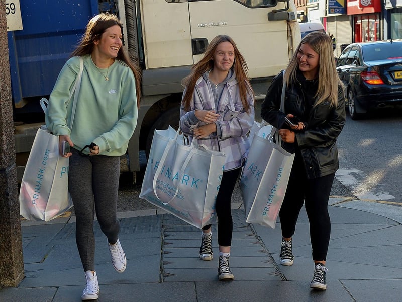 Happy shoppers on Friday morning as non-essential retails outlets reopen. Photo: George Sweeney / Derry Journal. DER2117GS – 020