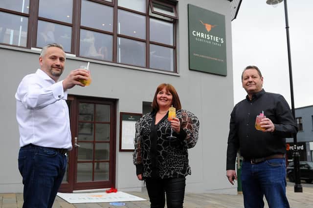 Christie's, Falkirk's new Scottish tapas restaurant, held a launch night featuring a piper and ribbon cutting ceremony by Barbara Bryceland. Pictured: David Blackwood, owner; Yvonne Latta, business partner; and Tom Malloy, owner. Picture: Michael Gillen.