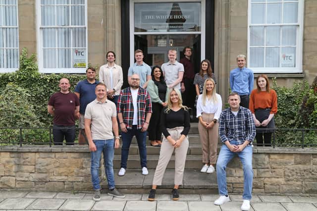 The Property Webmasters team outside their Hartlepool head office led by chief executive officer and founder Jamie Arthur (front left).