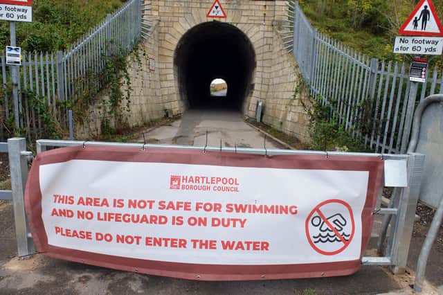 Hartlepool Borough Council water danger banner at the Bruce Tunnel.