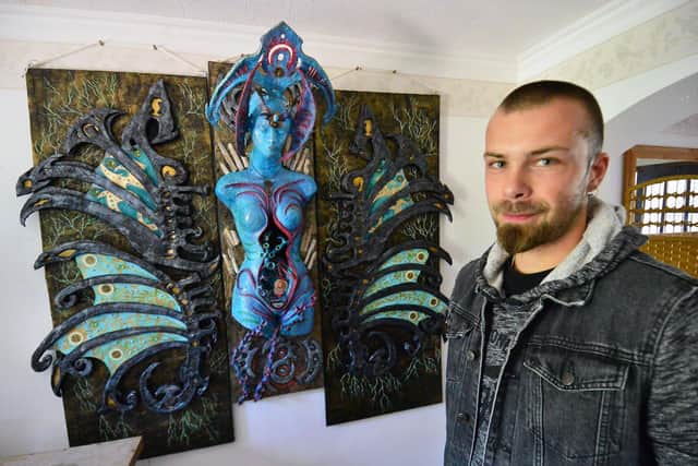 Danny Short with one of his larger pieces of his art work. Picture by FRANK REID