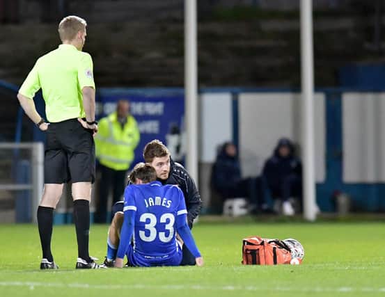 Luke James picks up a groin injury during Hartlepool United's 1-0 win over Exeter City in the FA Cup second round at Victoria Park (photo: Frank Reid).