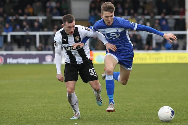 Mark Kitching of Hartlepool United in action with Notts County's Callum Roberts  during the Vanarama National League match between Hartlepool United and Notts County at Victoria Park, Hartlepool on Saturday 22nd February 2020. (Credit: Mark Fletcher | MI News)