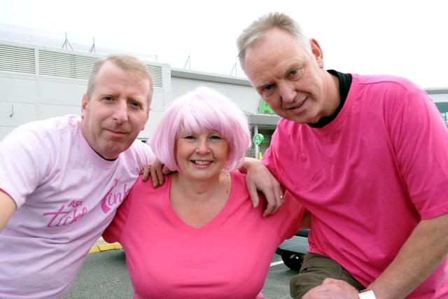 ASDA's Tickled Pink charity bike riders Dave Bache and John Taylor are wished good luck by fellow Marina Way staff member, Joanne Tweddle, in 2013.