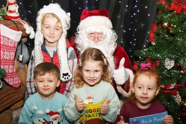 Children Samuel, Marshall, Ariella and Cara in Santa's Grotto at Middleton Grange Shopping Centre. Picture by FRANK REID