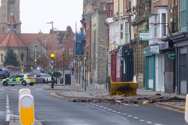 A police car stands watch in Hartlepool town centre after masonry fell in Church Street.