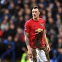 BIRKENHEAD, ENGLAND - JANUARY 26: Phil Jones of Manchester United covered in mud during the FA Cup Fourth Round match between Tranmere Rovers and Manchester United at Prenton Park on January 26, 2020 in Birkenhead, England. (Photo by Gareth Copley/Getty Images)