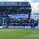 Hartlepool United fans display a banner in support of the UK steel industry at the Suit Direct Stadium on Good Friday.