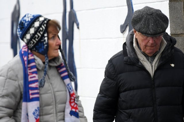 This couple get ready to watch Hartlepool United play Dagenham and Redbridge FC.