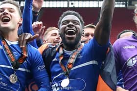Zaine Francis-Angol celebrating Pools' promotion to the Football League.