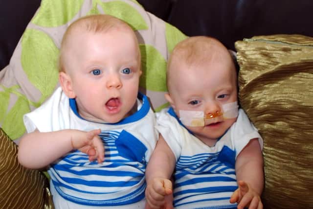 The twins aged one.