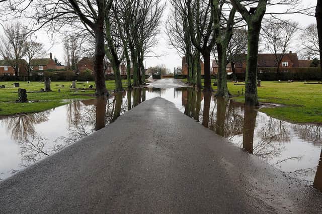 Standing rain water on the road from Brierton Lane into Stranton Cemetery in 2018.